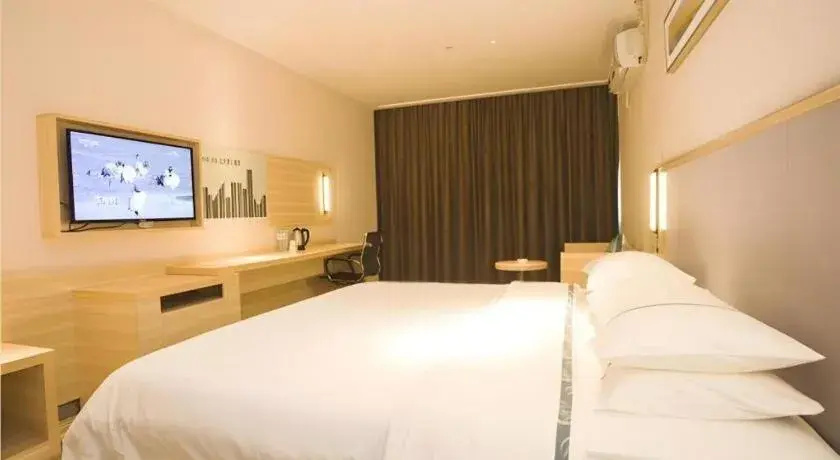 Bed in City Comfort Inn Zhanjiang South Railway Station Bed in City Comfort Inn Zhanjiang South Railway Station