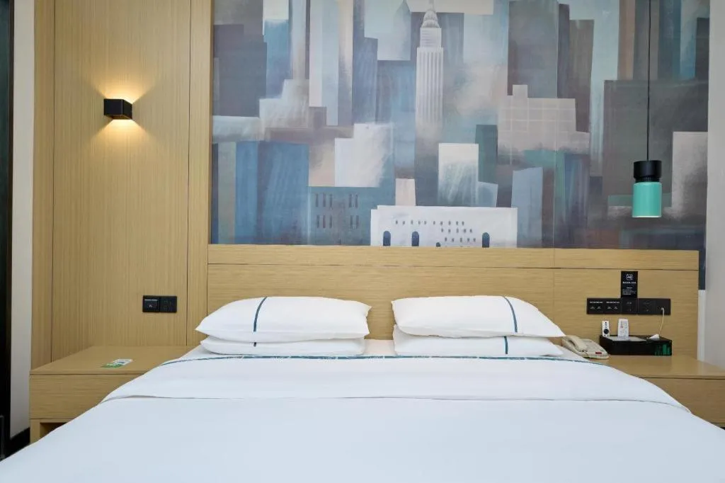 Bed in City Comfort Inn Huanggang Luotian Yishui Waitan