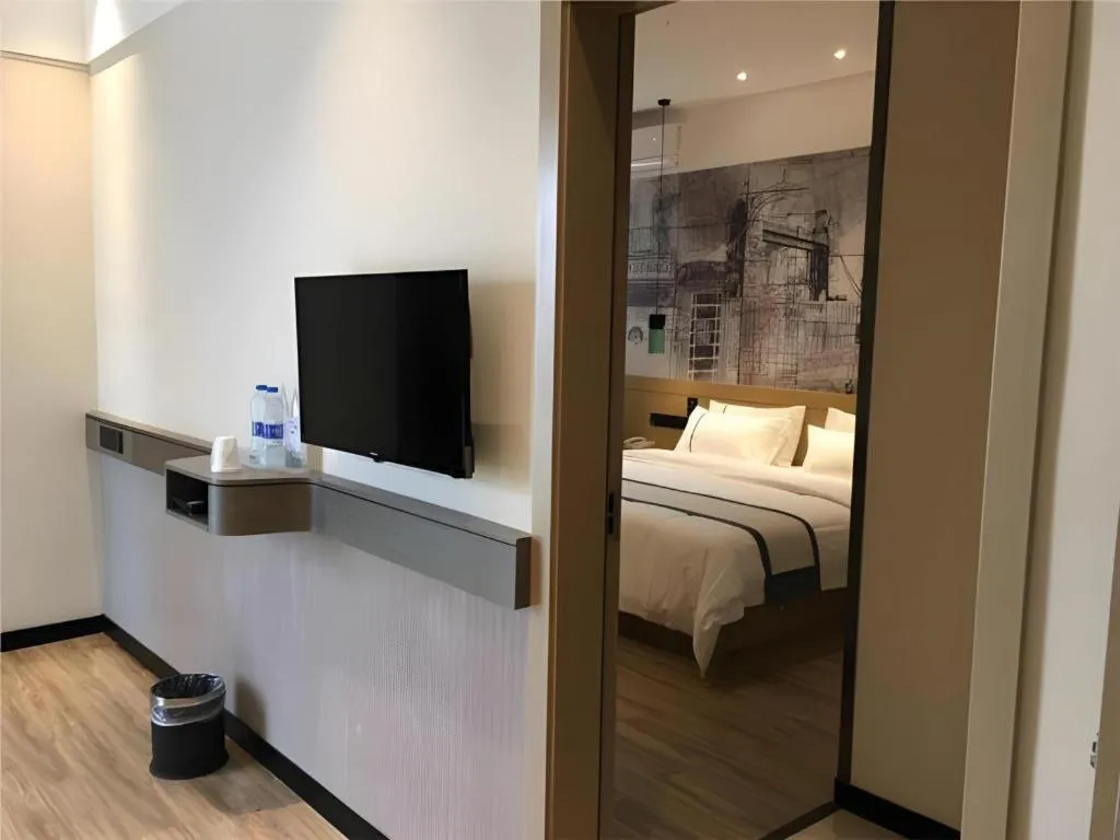 Bed in City Comfort Inn Huanggang Luotian Yishui Waitan