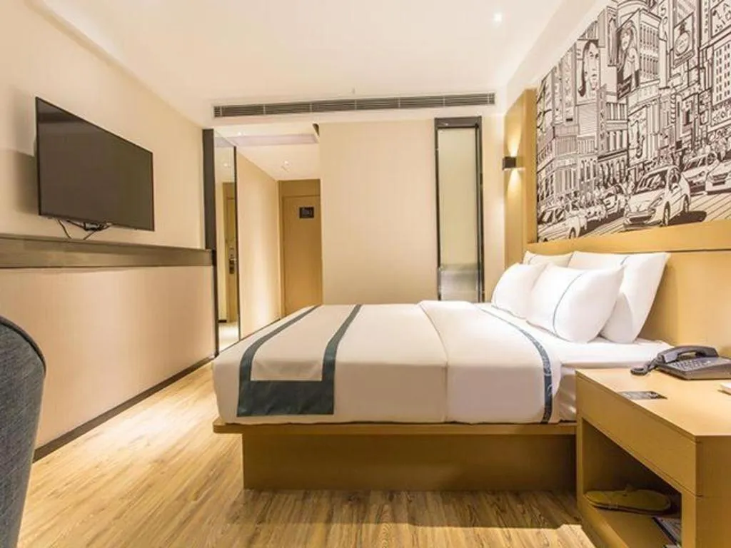 Bed in City Comfort Inn Liuzhou Chengzhong Wanda Haiguan