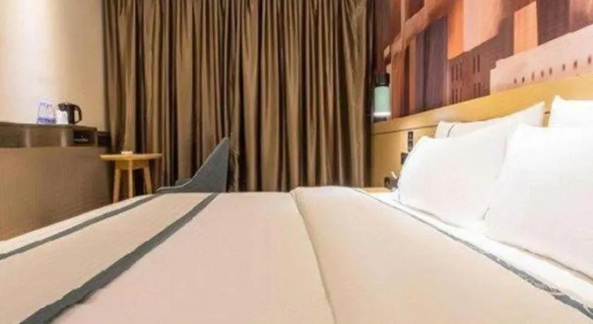 Bed in City Comfort Inn Liuzhou Chengzhong Wanda Haiguan