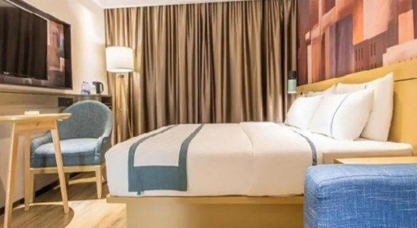 Bed in City Comfort Inn Liuzhou Chengzhong Wanda Haiguan