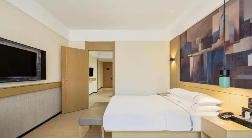 Bed in City Comfort Inn Liuzhou Chengzhong Wanda Haiguan