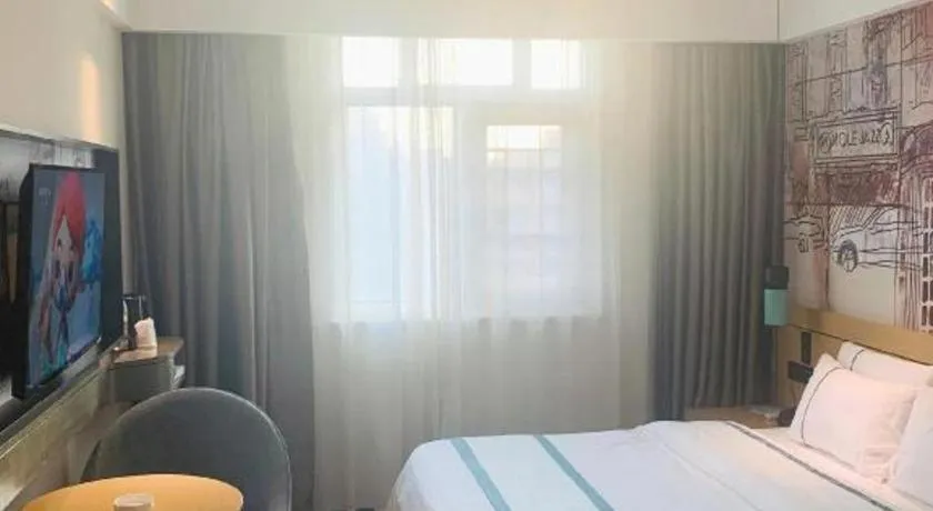 Bed in City Comfort Inn Liuzhou Chengzhong Wanda Haiguan