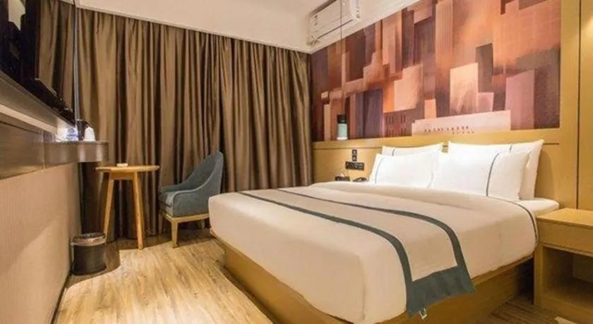 Bed in City Comfort Inn Liuzhou Chengzhong Wanda Haiguan
