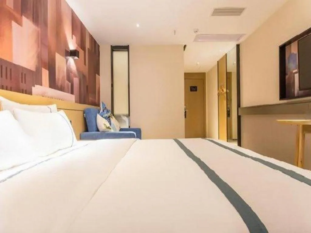Bed in City Comfort Inn Liuzhou Chengzhong Wanda Haiguan