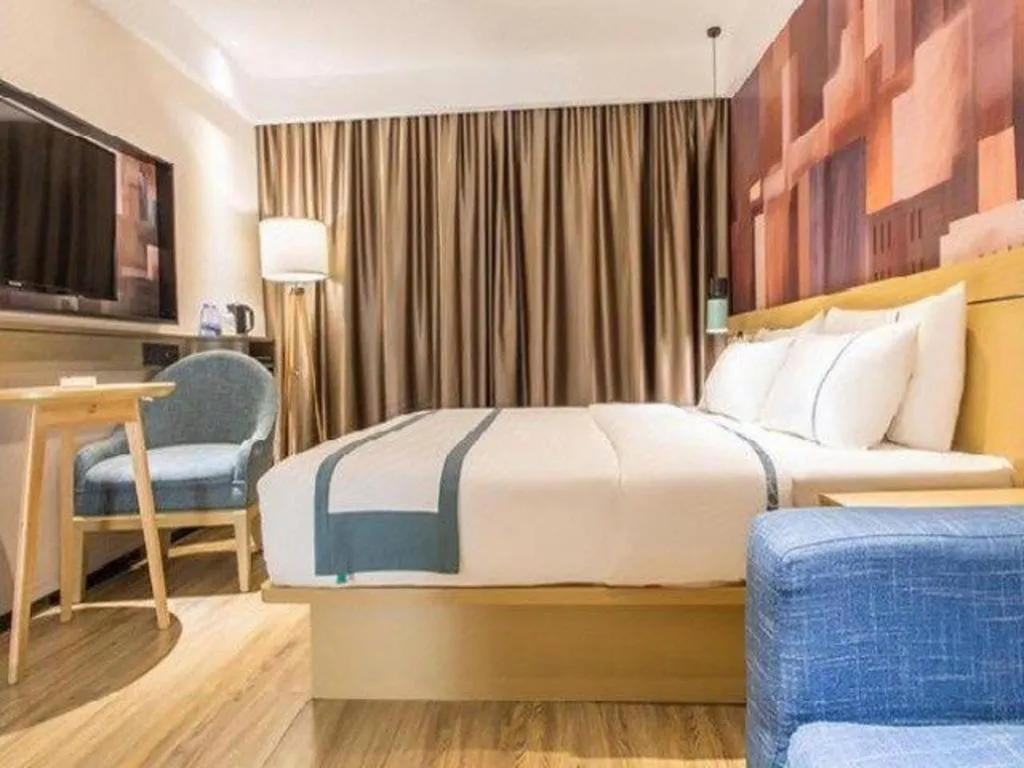 Bed in City Comfort Inn Liuzhou Chengzhong Wanda Haiguan