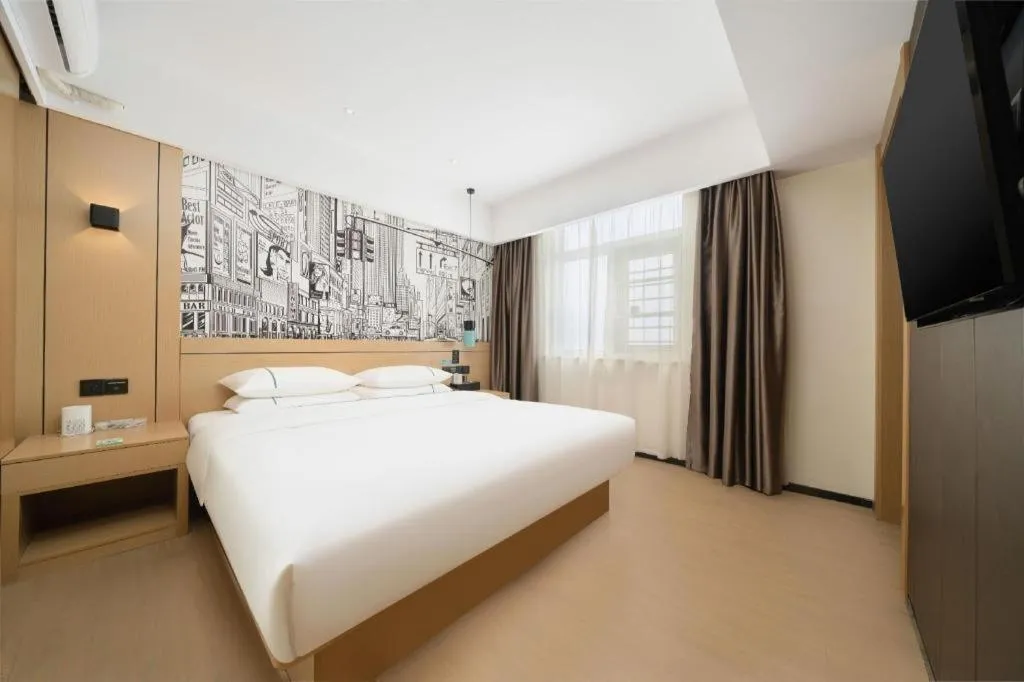 Bed in City Comfort Inn Liuzhou Chengzhong Wanda Haiguan