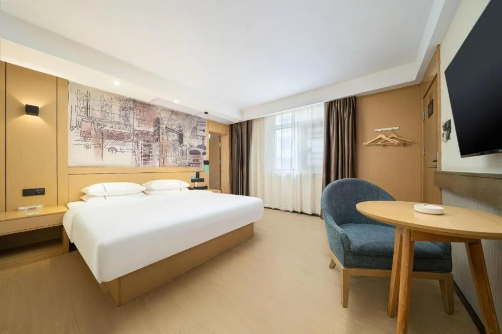 Bed in City Comfort Inn Liuzhou Chengzhong Wanda Haiguan