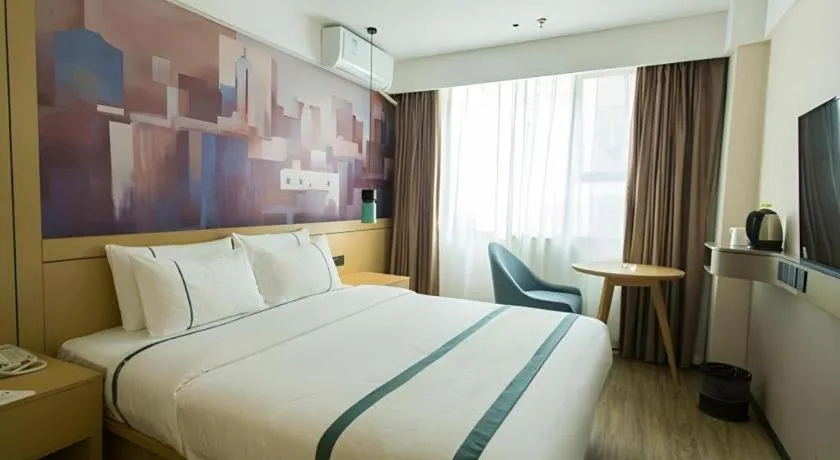 Bed in City Comfort Inn Guigang Hecheng Wanda Plaza