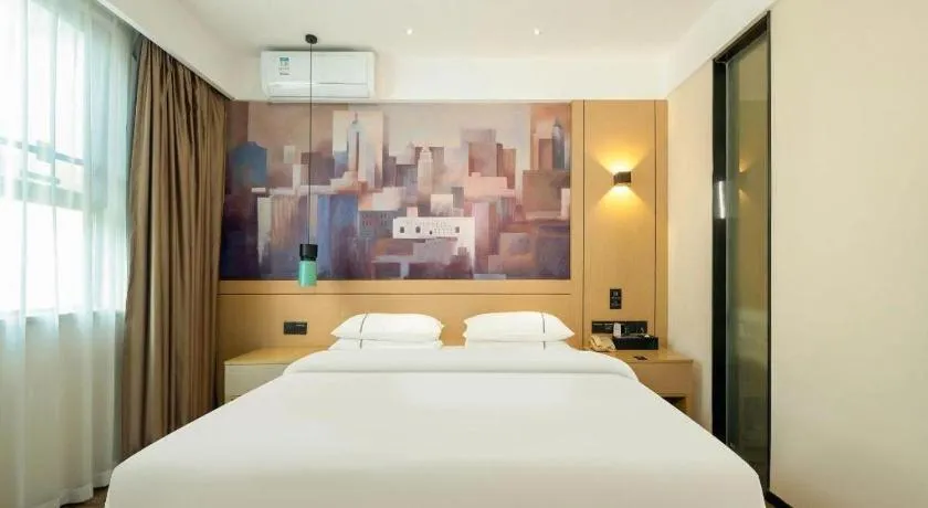 Bed in City Comfort Inn Guigang Hecheng Wanda Plaza