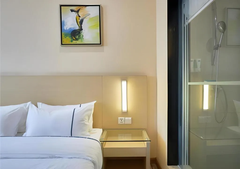 Bed in City Comfort Inn Liuzhou Baisha Bus Station Shengli Barbecue City