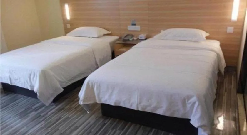 Bed in City Comfort Inn Zhongshan Dongsheng One Plus One