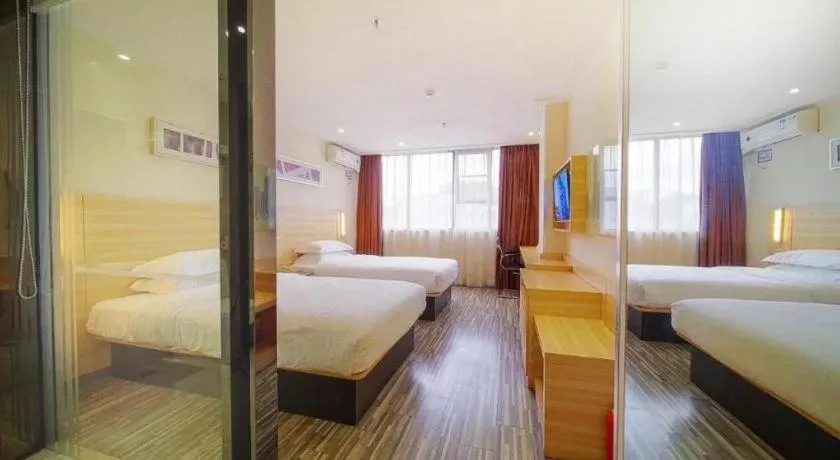 Bed in City Comfort Inn Zhongshan Dongsheng One Plus One