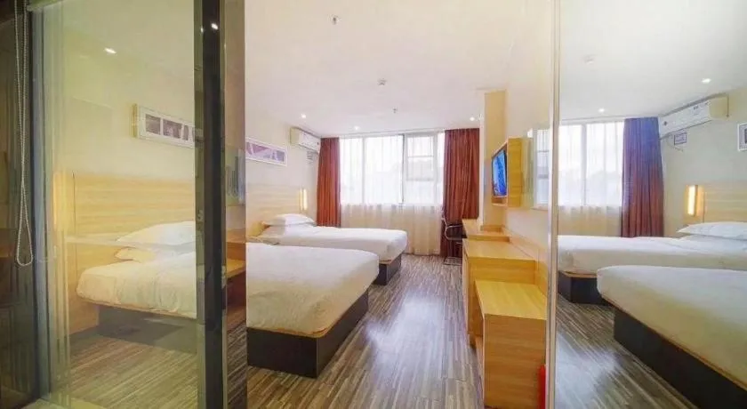 Bed in City Comfort Inn Zhongshan Dongsheng One Plus One