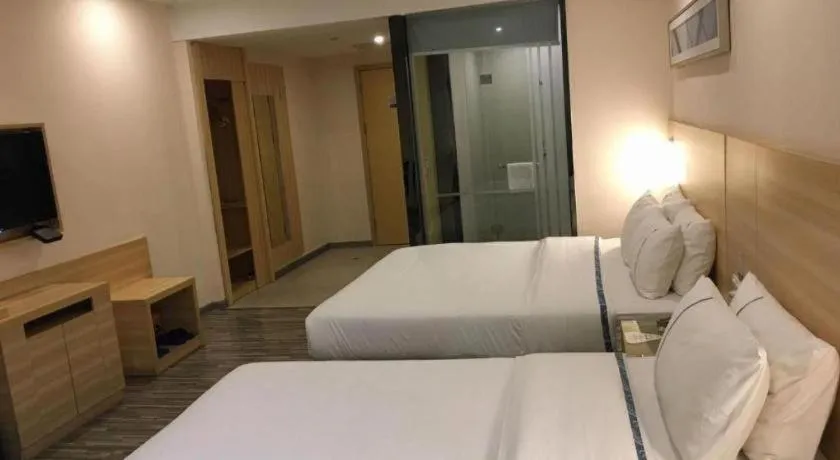 Bed in City Comfort Inn Zhongshan Dongsheng One Plus One