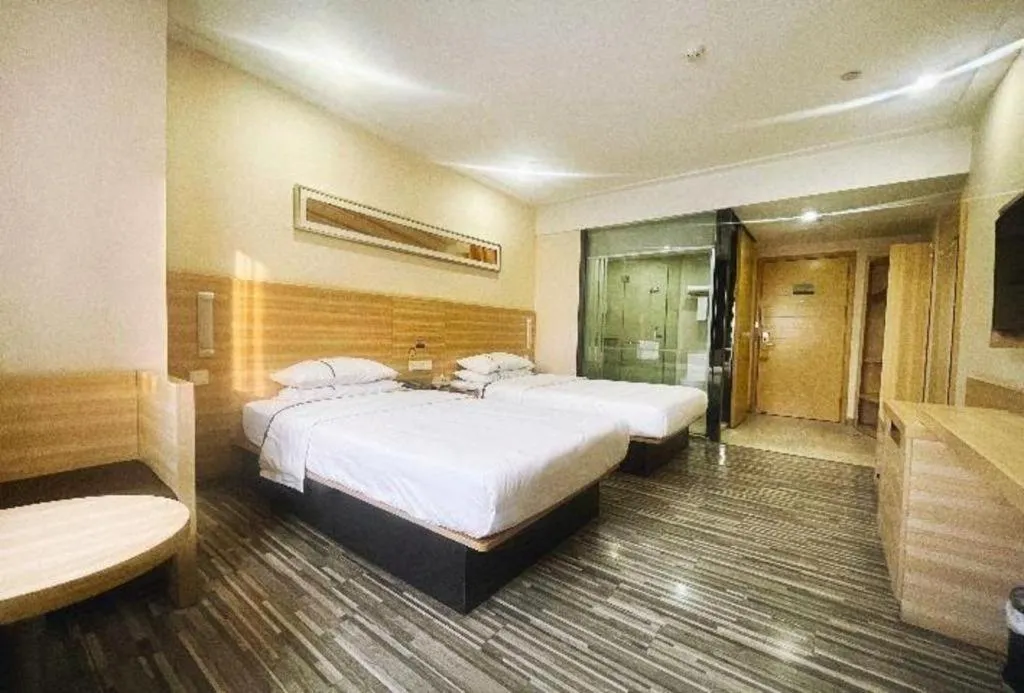 Bed in City Comfort Inn Zhongshan Dongsheng One Plus One
