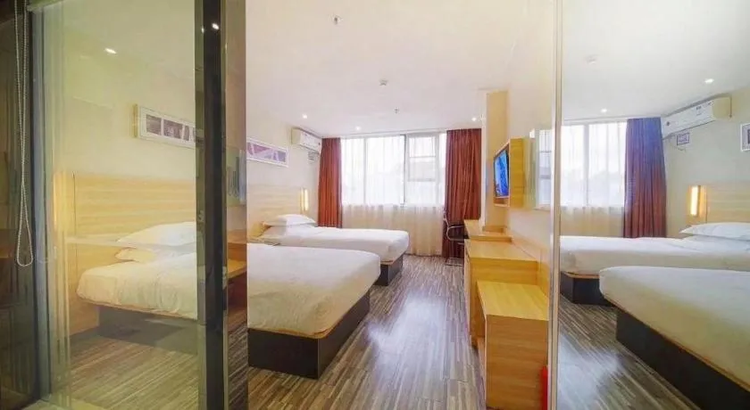 Bed in City Comfort Inn Zhongshan Dongsheng One Plus One