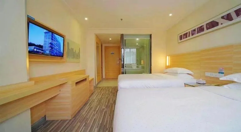 Bed in City Comfort Inn Zhongshan Dongsheng One Plus One