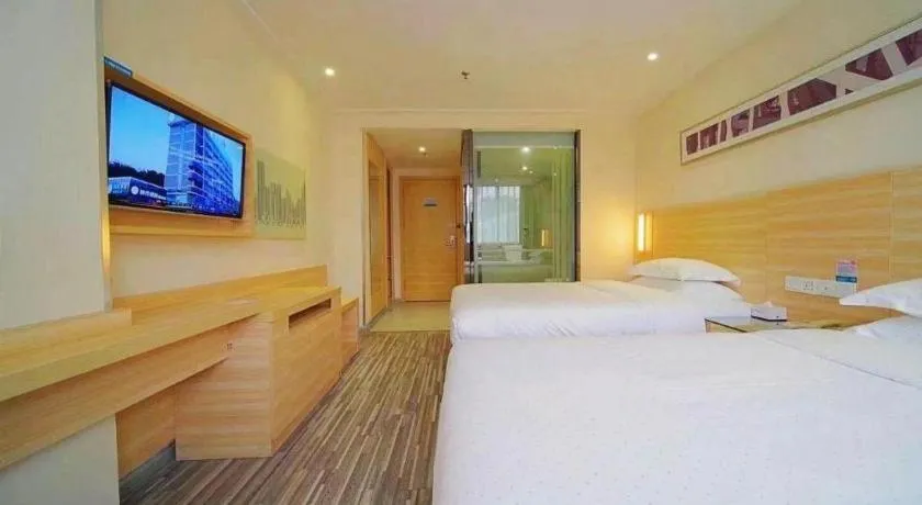 Bed in City Comfort Inn Zhongshan Dongsheng One Plus One
