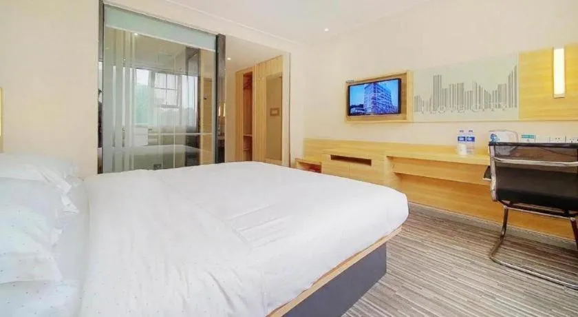 Bed in City Comfort Inn Zhongshan Dongsheng One Plus One