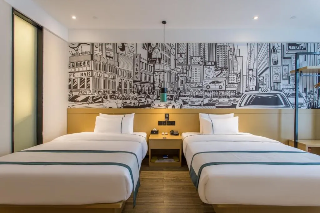 Bed in City Comfort Inn Liupanshui Sports Center