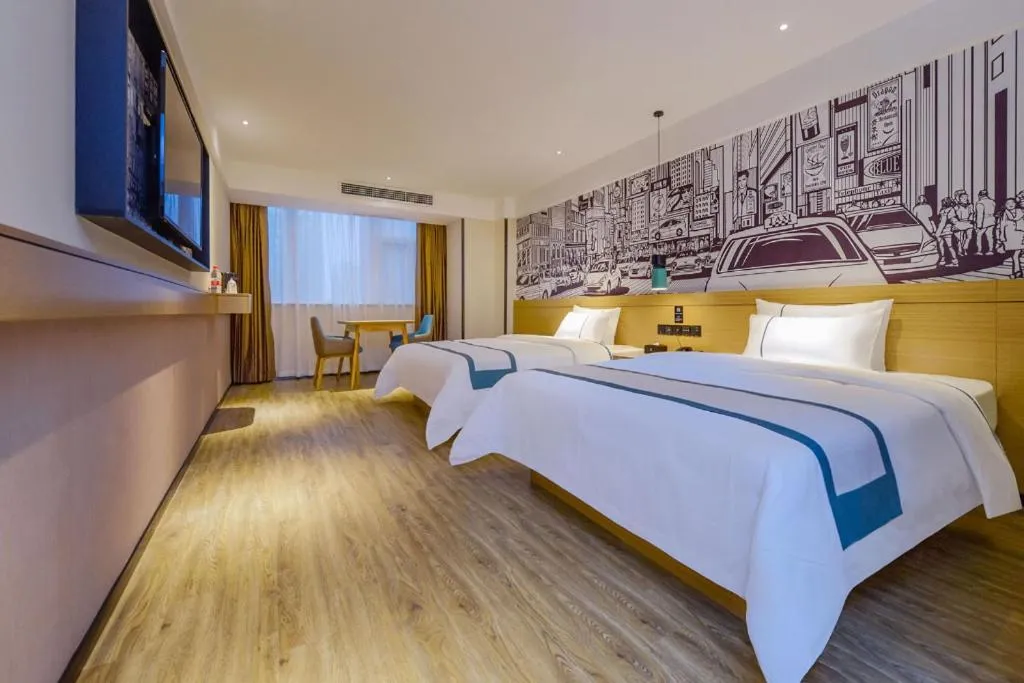 Bed in City Comfort Inn Liupanshui Sports Center