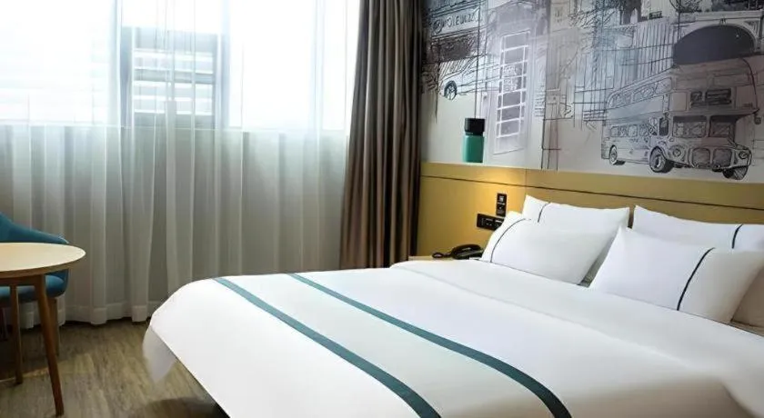 Bed in City Comfort Inn Liupanshui Sports Center