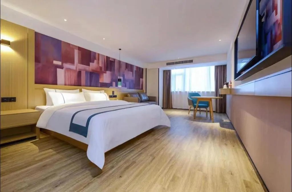 Bed in City Comfort Inn Liupanshui Sports Center