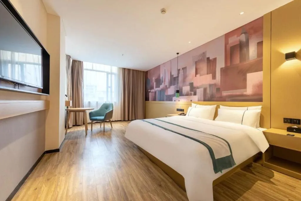 Bed in City Comfort Inn Liupanshui Sports Center