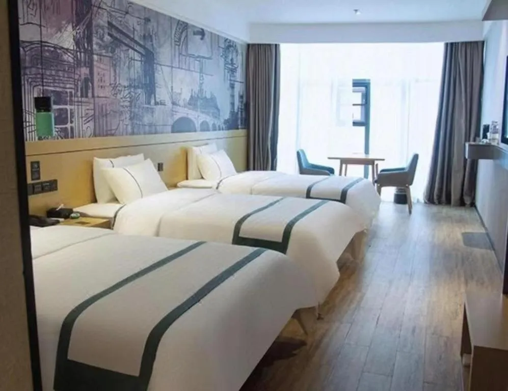 Bed in City Comfort Inn Liupanshui Sports Center