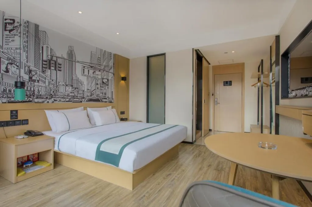 Bed in City Comfort Inn Liupanshui Sports Center