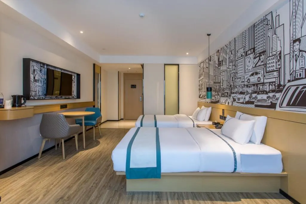 Bed in City Comfort Inn Liupanshui Sports Center