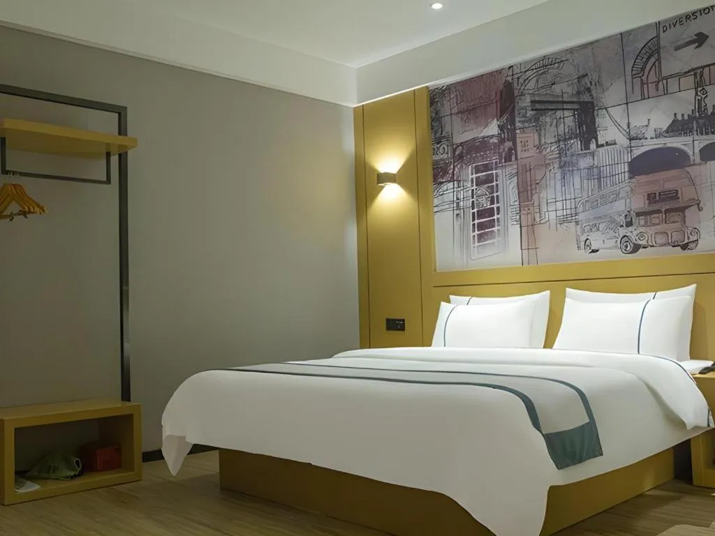 Bed in City Comfort Inn Liupanshui Sports Center