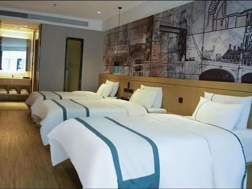 Bed in City Comfort Inn Liupanshui Sports Center