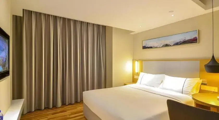 Bed in City Comfort Inn Jingzhou Wanda Plaza Bed in City Comfort Inn Jingzhou Wanda Plaza