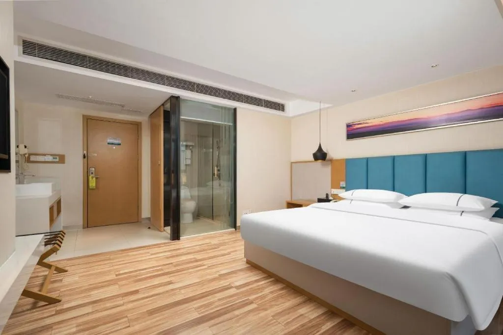 Bed in City Comfort Inn Jingzhou Wanda Plaza