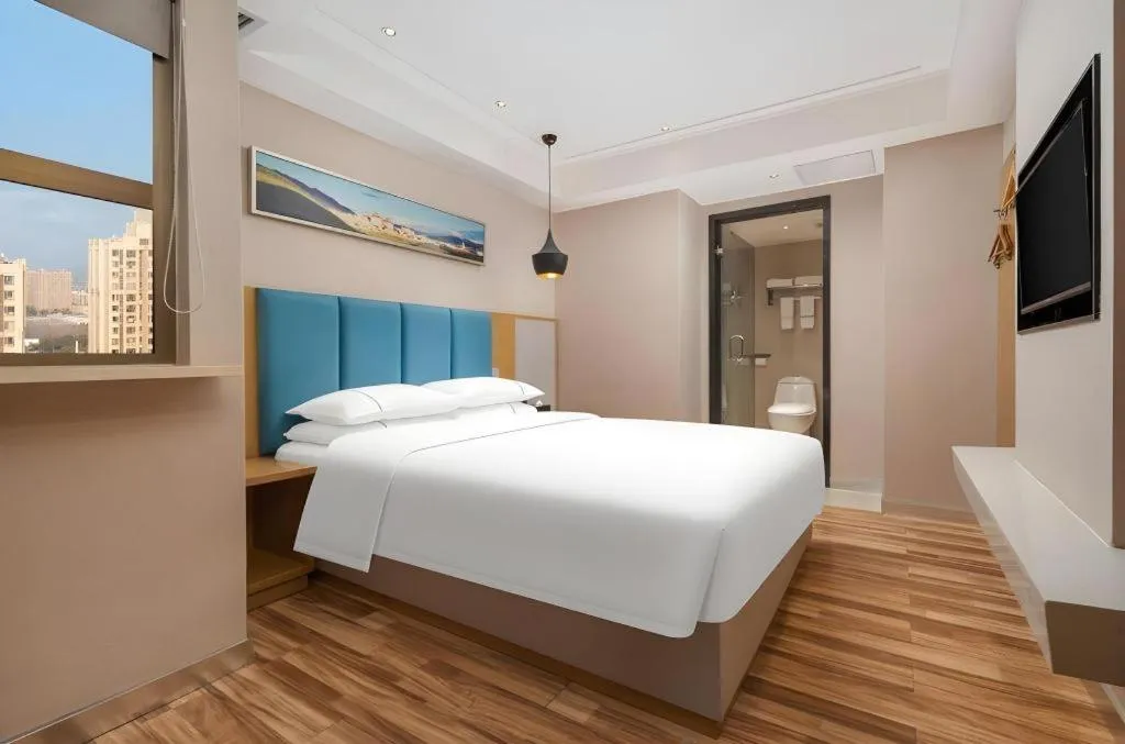 Bed in City Comfort Inn Jingzhou Wanda Plaza