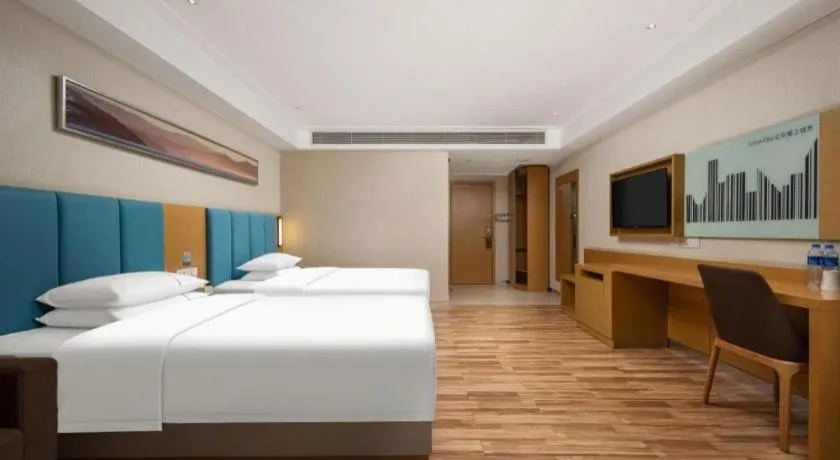 Bed in City Comfort Inn Jingzhou Wanda Plaza