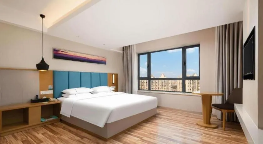 Bed in City Comfort Inn Jingzhou Wanda Plaza