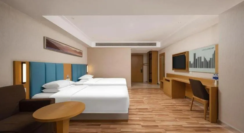 Bed in City Comfort Inn Jingzhou Wanda Plaza