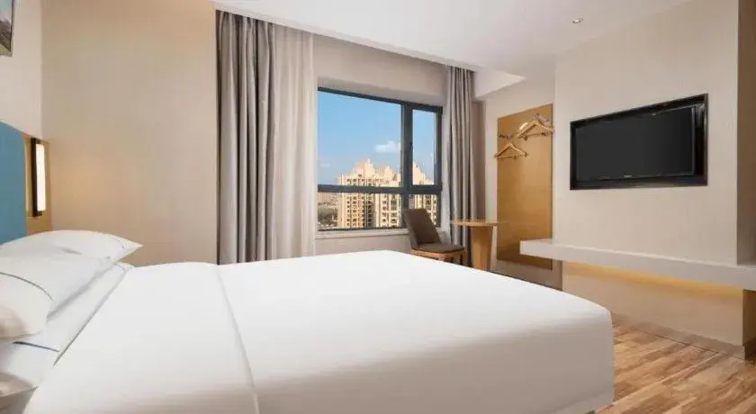 Bed in City Comfort Inn Jingzhou Wanda Plaza Bed in City Comfort Inn Jingzhou Wanda Plaza