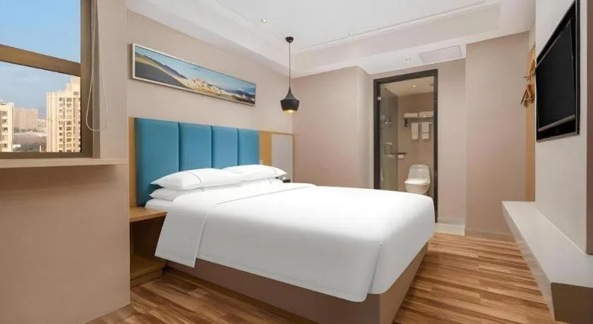 Bed in City Comfort Inn Jingzhou Wanda Plaza