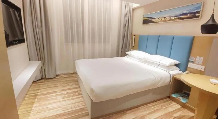 Bed in City Comfort Inn Jingzhou Wanda Plaza