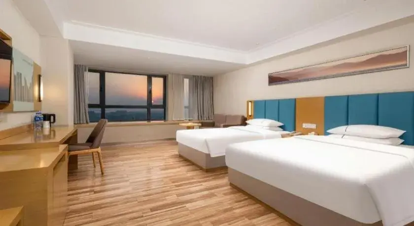 Bed in City Comfort Inn Jingzhou Wanda Plaza Bed in City Comfort Inn Jingzhou Wanda Plaza