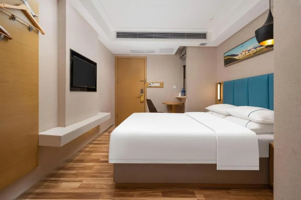 Bed in City Comfort Inn Jingzhou Wanda Plaza