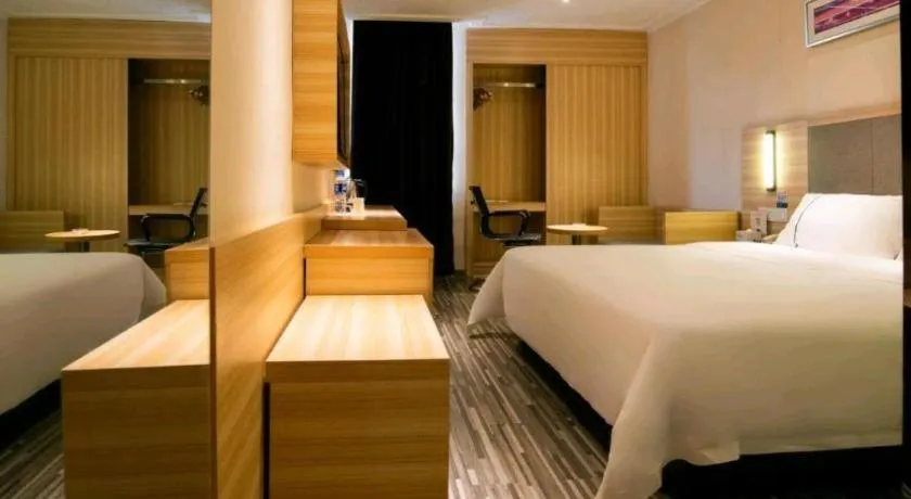 Bed in City Comfort Inn Changsha Jingwanzi Desiqin Plaza