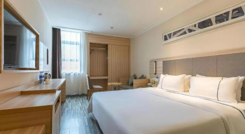 Bed in City Comfort Inn Changsha Jingwanzi Desiqin Plaza