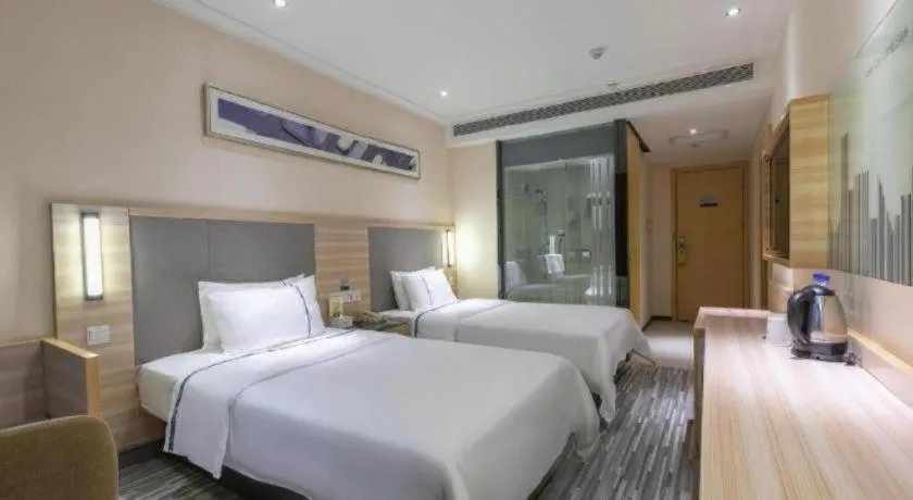 Bed in City Comfort Inn Changsha Jingwanzi Desiqin Plaza
