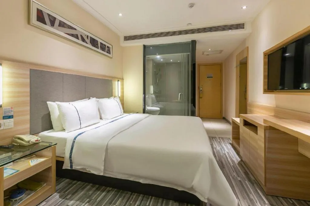 Bed in City Comfort Inn Changsha Jingwanzi Desiqin Plaza